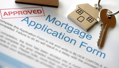 House keys on mortgage application form