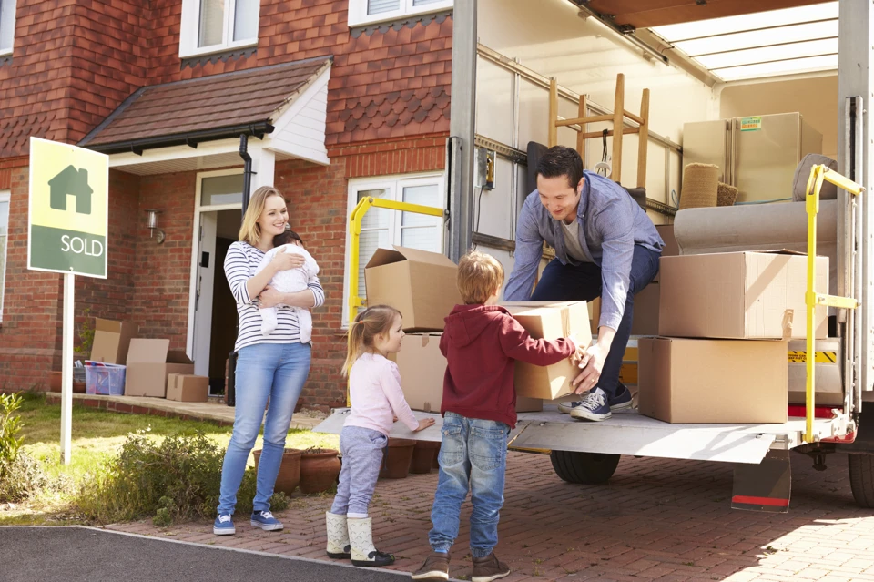 Family unloading boxes