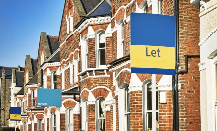 Houses with To Let signs outside