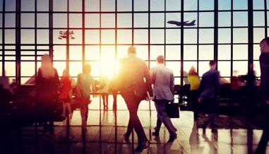 silhouette of couple in an airport