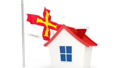 Guernsey Flag with house silhouette 
