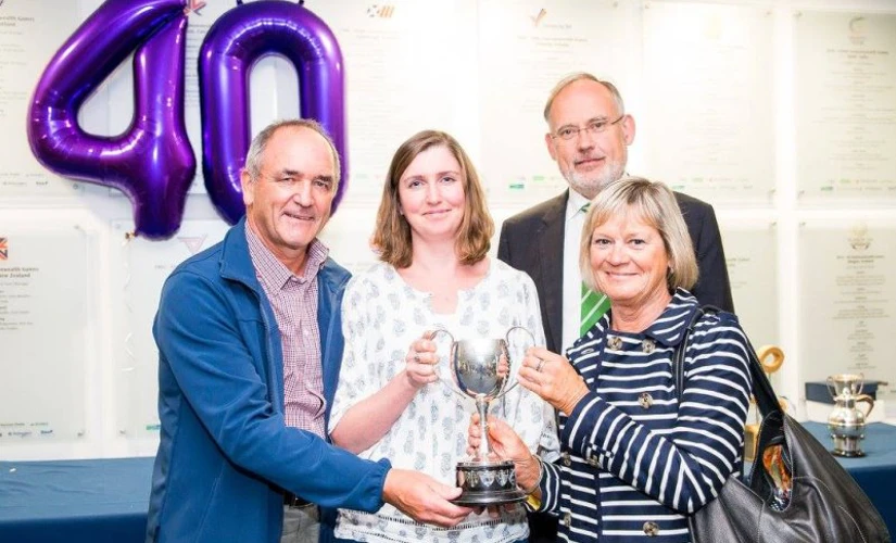 group holding Swimarathon Trophy 