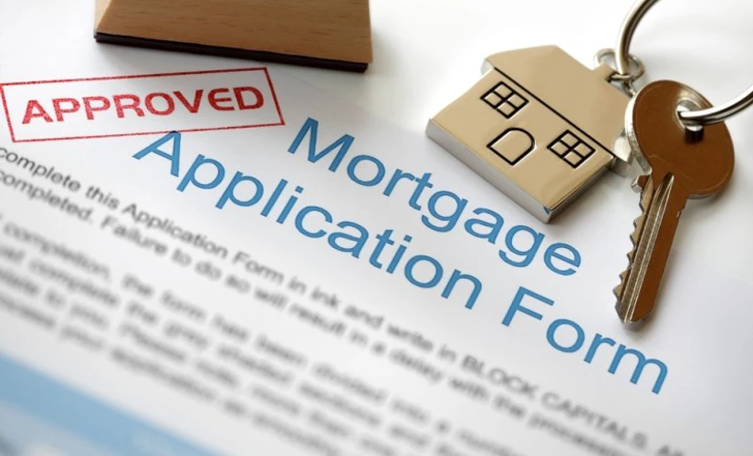 House keys on mortgage application form