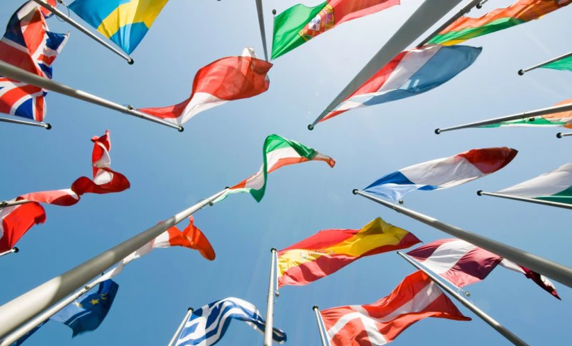 Upwards view of international flags