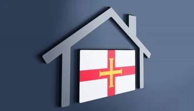 Guernsey Flag with house silhouette 