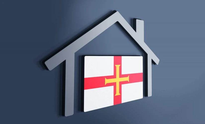 Guernsey Flag with house silhouette 