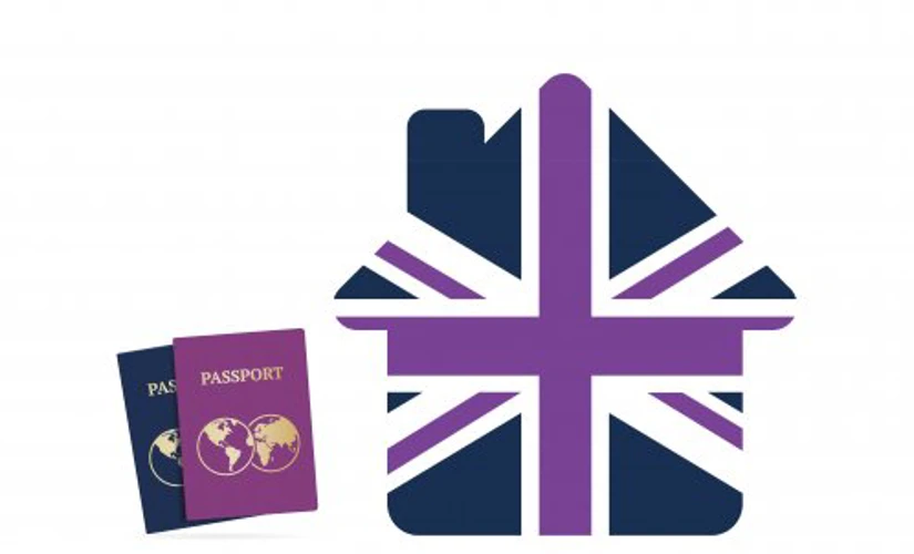 Union jack house alongside two passports