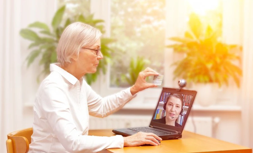 woman talking to a person throw video call