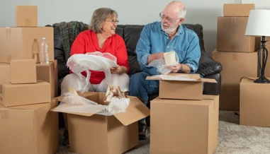 elderly couple unboxing