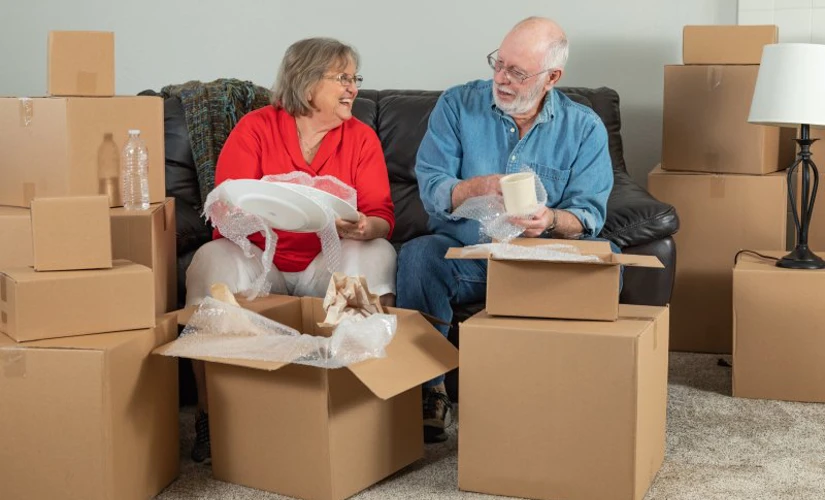 elderly couple unboxing