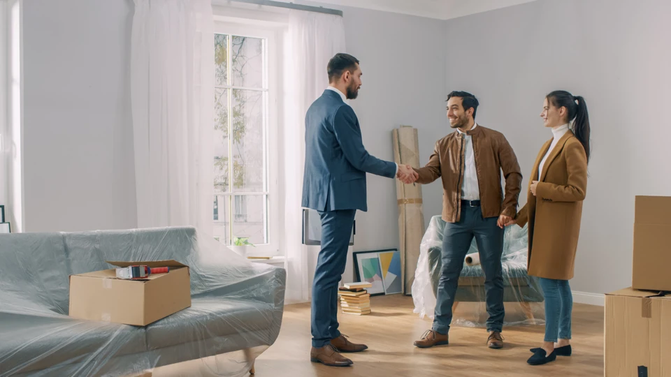 People meeting in an unfinished room