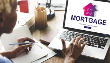 people scrolling through a laptop