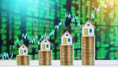 rising pennies with small houses on top