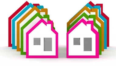 houses stacked up in different colours