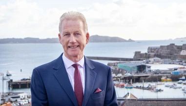 Nigel Pascoe with Guernsey seafront background