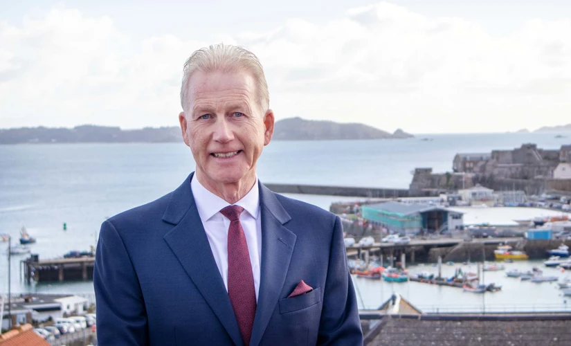 Nigel Pascoe with Guernsey seafront background