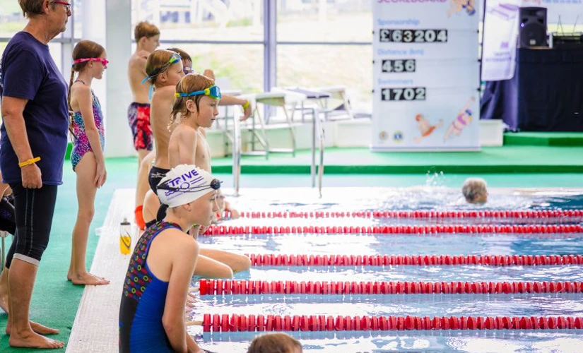 children lined up to start swimming in Skipton Swimarathon