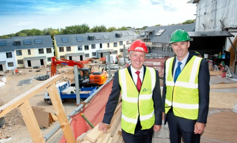 Two men on a construction site