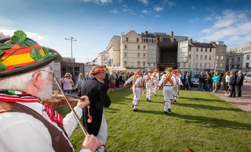 group of men dancing in Jersey