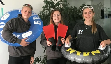 Young group with swimming equipment  