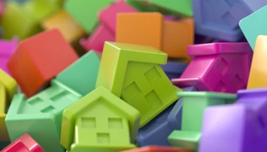 pile of coloured acrylic houses