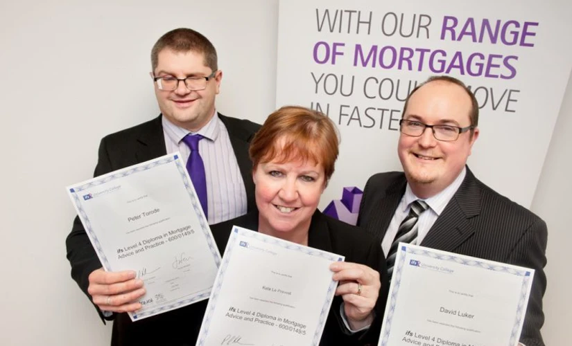 Skipton staff holding mortgage awards
