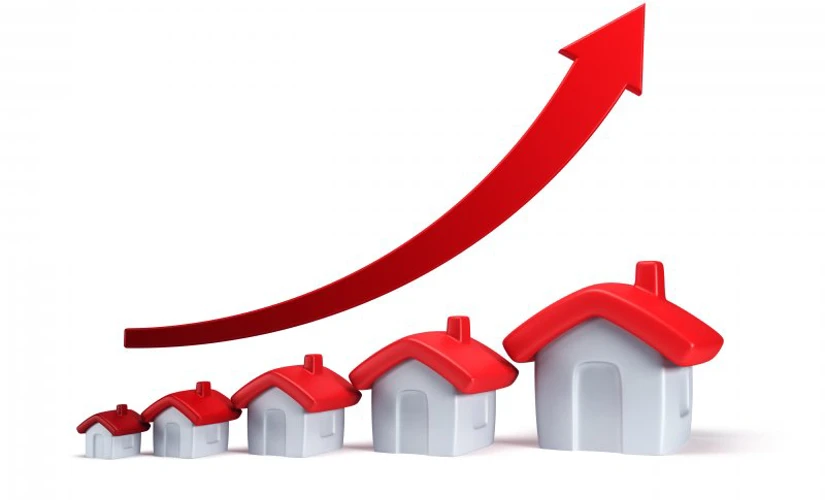 Stock arrow increasing with houses underneath